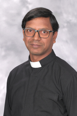 Father Suresh Bandha, Pastor